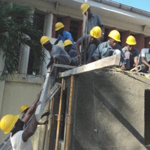 Students gaining experience in building construction in Cap-Haitien