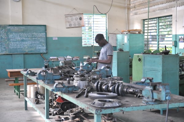 A student working in the machine shop